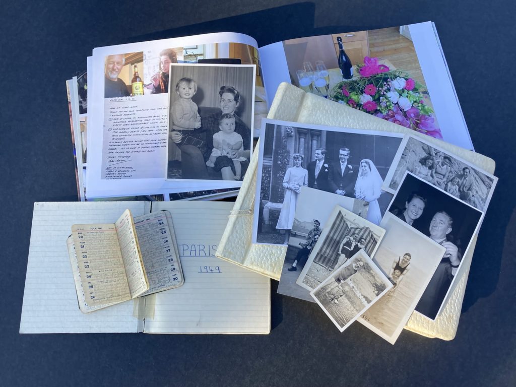 Image showing a collection of vintage photos and a finished book